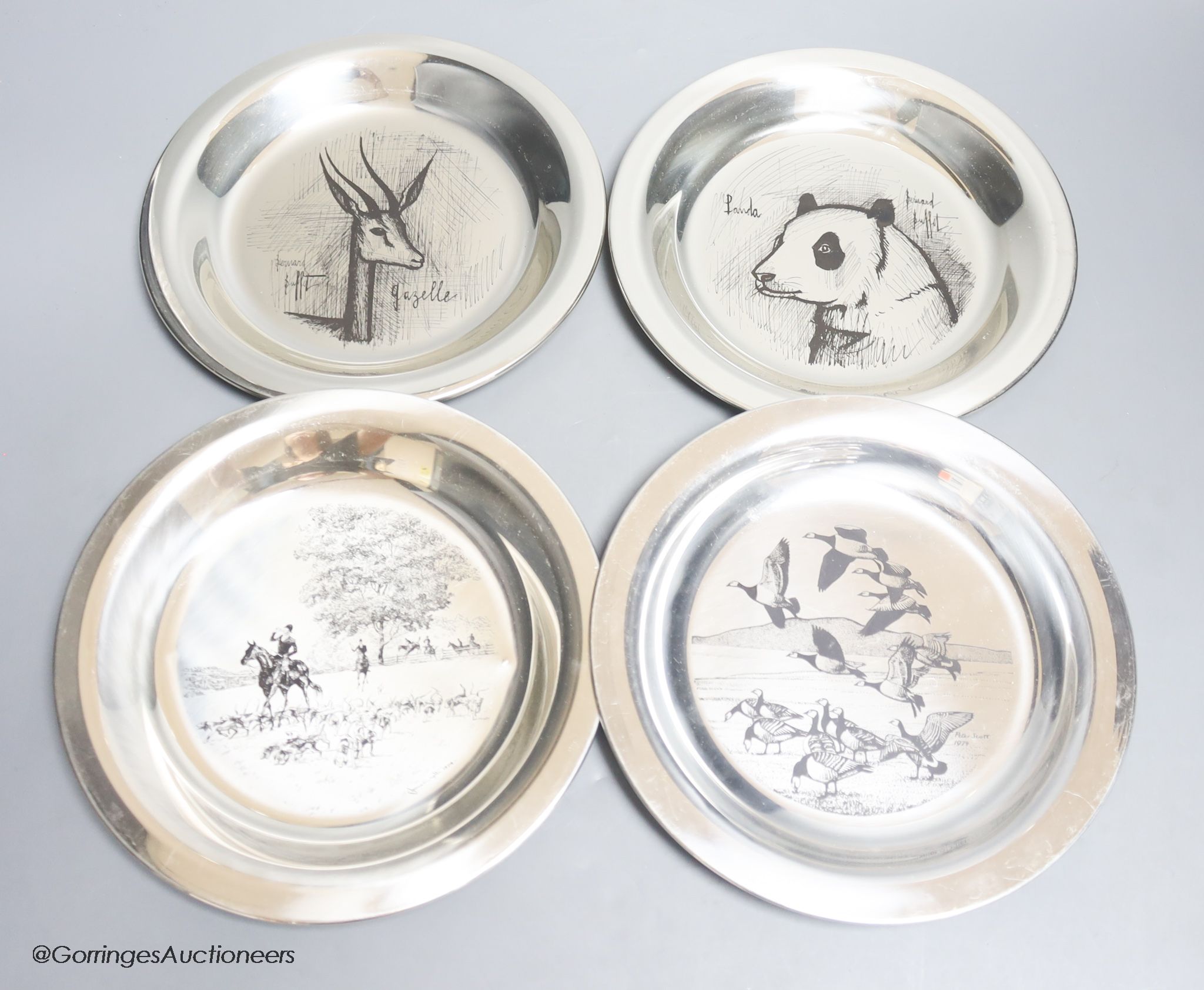 Four modern silver plates, two decorated after Bernard Buffet, dated verso 1973-4, detailing a Gazelle and Panda, each marked ‘Gravée à l’eau forte sue agent sterling 1er titre’ together with an example decorated by Pete